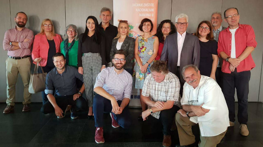 What are obligations of public media regarding reporting about national minorities in BiH?